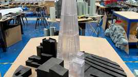 RWDI SLA Printed Shard Model With FMD Printed Red Models In Background Compressed